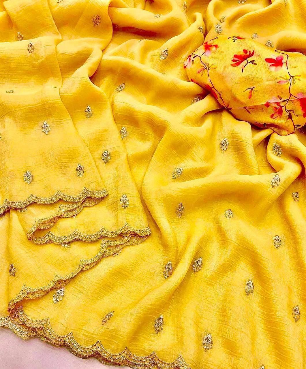 Yellow georgette crush embroidered saree with scalloped border