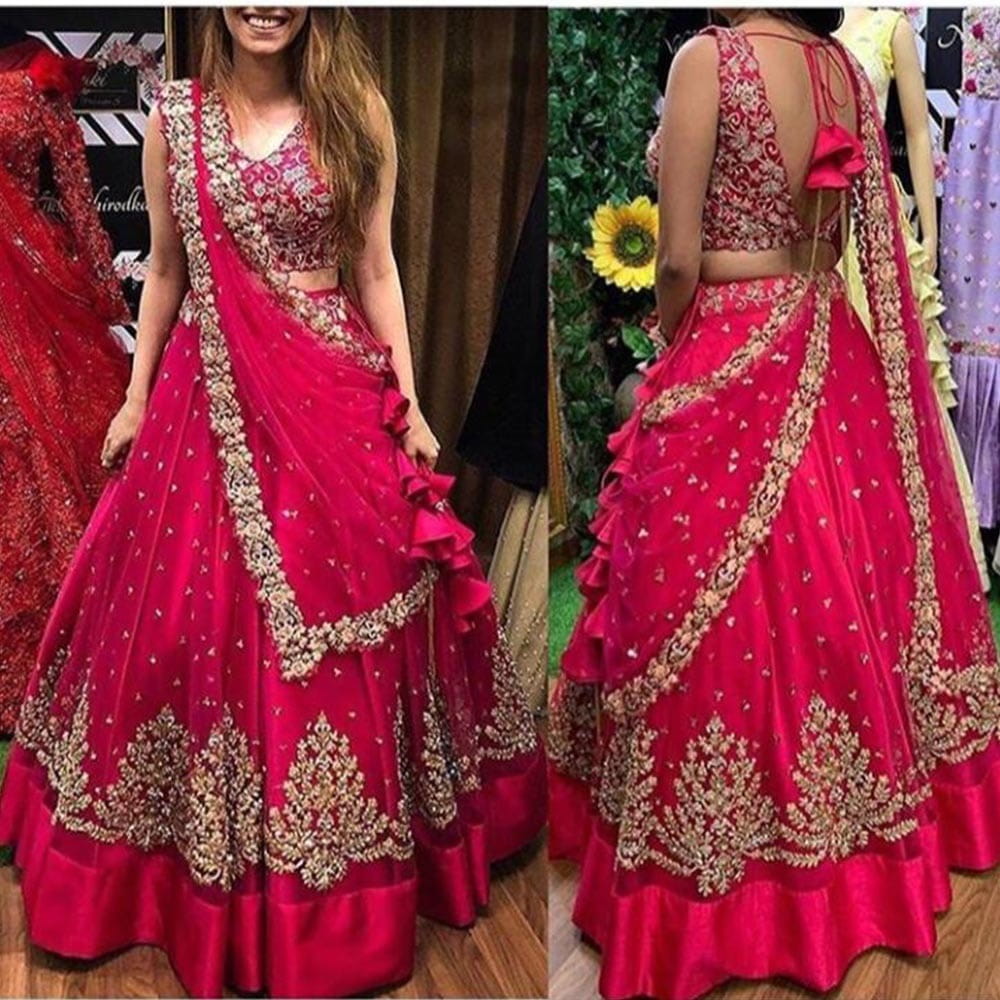 Gorgeous Rani Pink Net Embroidered Zari Work New Lehenga Choli Design Online