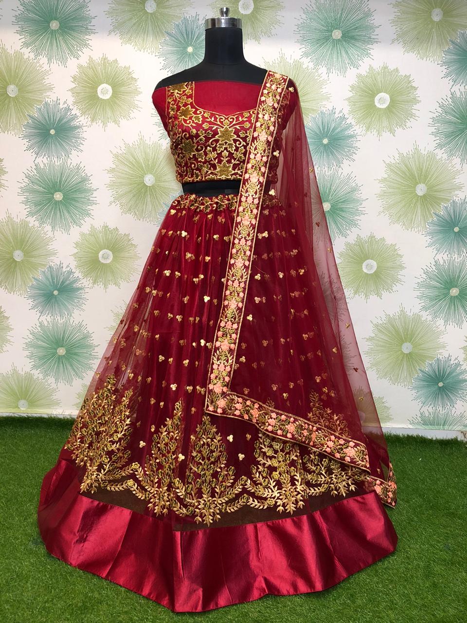 Pulchritudinous Maroon Net With Zari Embroidered Work New Lehenga Choli Design Online