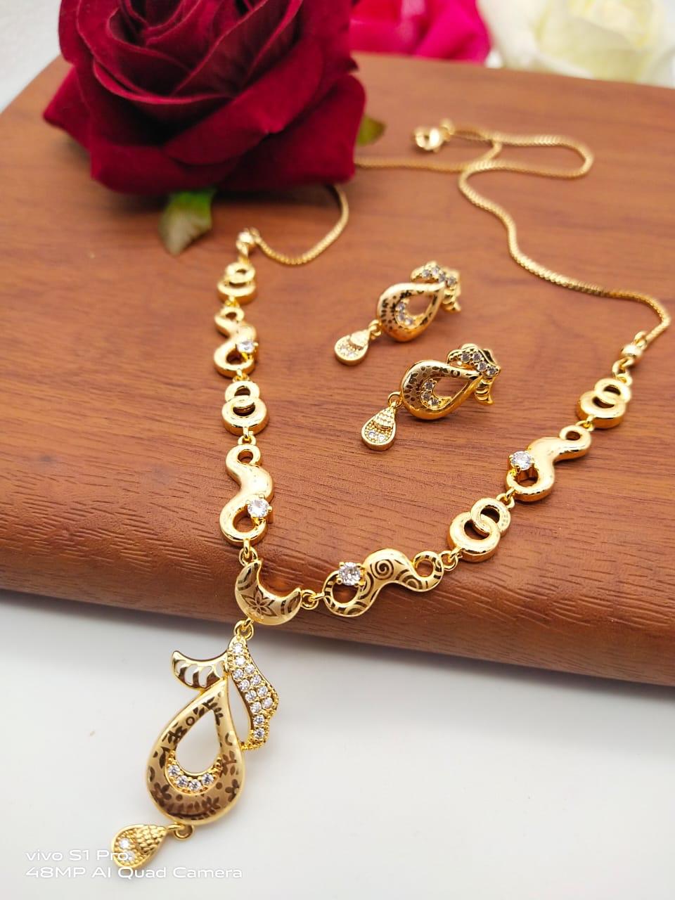 Fab White Diamond Golden Imitation Necklace Set Design