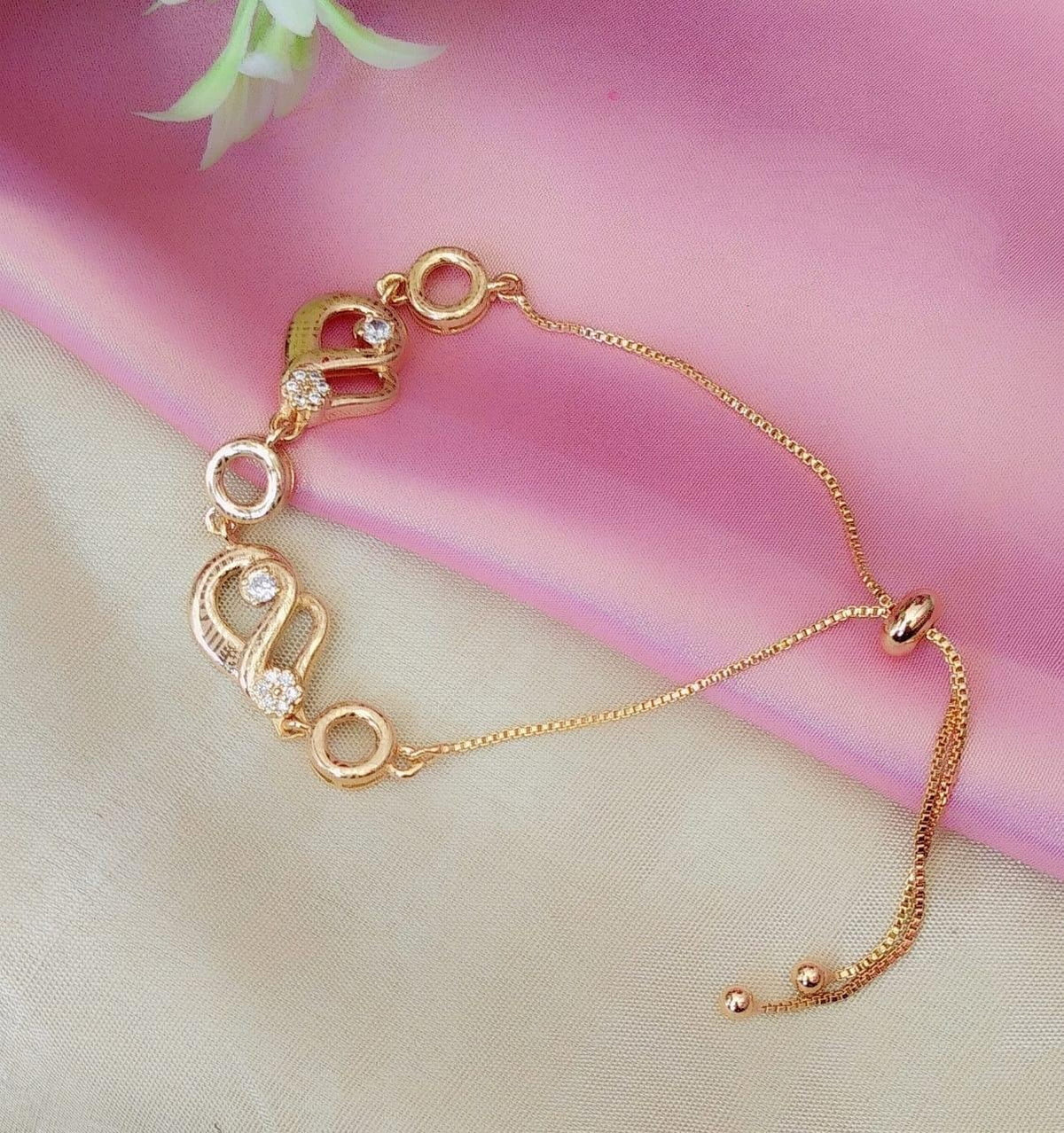 Pulchritudinous White American Diamond Golden Artificial Bracelet for Women