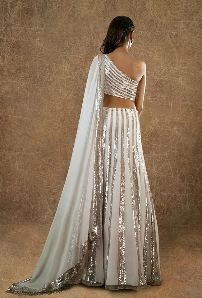 Outstanding White Color Fancy Sequence Embroidered Work Georgette Function Wear Lehenga Choli