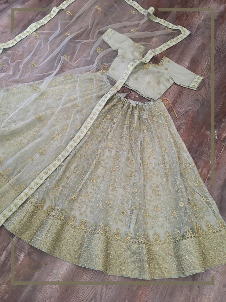 Graceful Light Green Color Traditional Wear Soft Net Designer Glitter Zari Embroidered Work Lehenga CholI