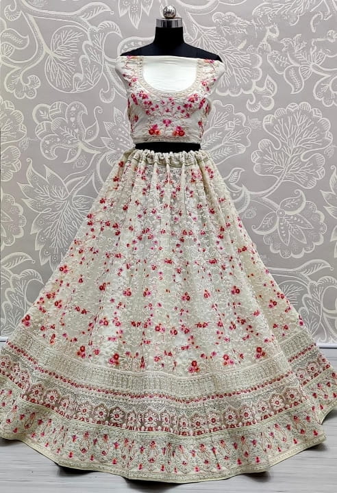 Demanding Off White Color Bridal Wear Embroidered Thread Multi Diamond Work Soft Net Lehenga Choli