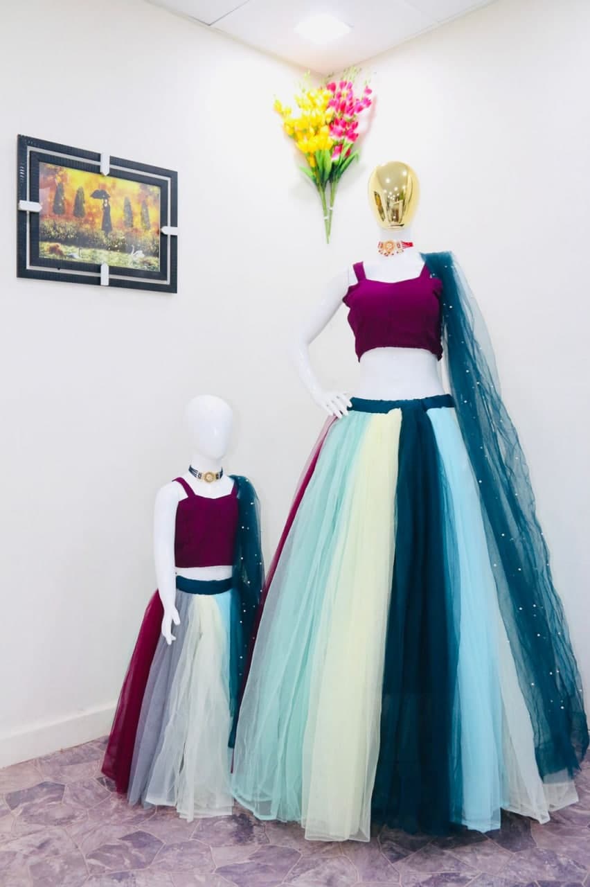 Magnetic Blue Color Net Wedding Wear Mother Daughter Lehnega Choli