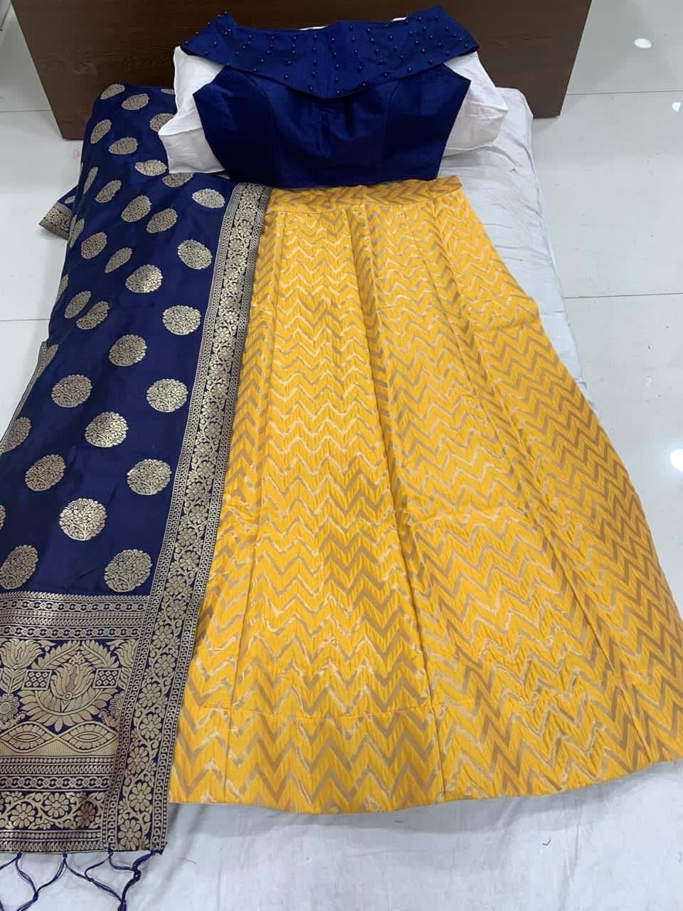 Intricate Yellow Color Brocade Banarasi Design Lehenga Choli For Occasion Wear