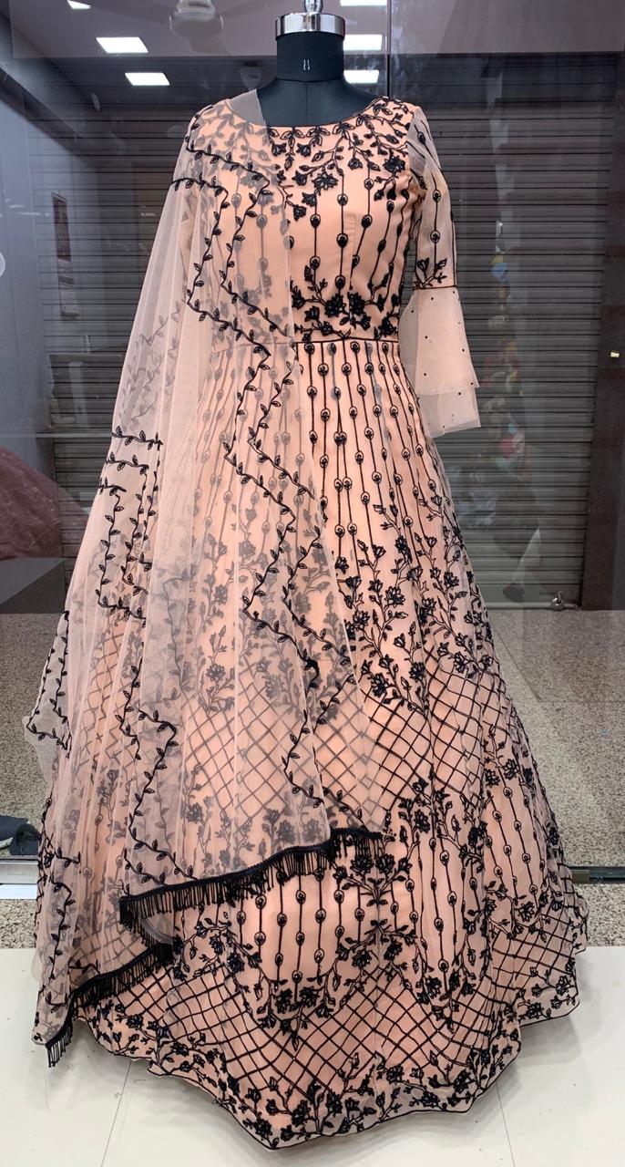 Dusty Peach Color Net Thread Embroidered Stone Pasting Work Designer Gown For Festive Wear