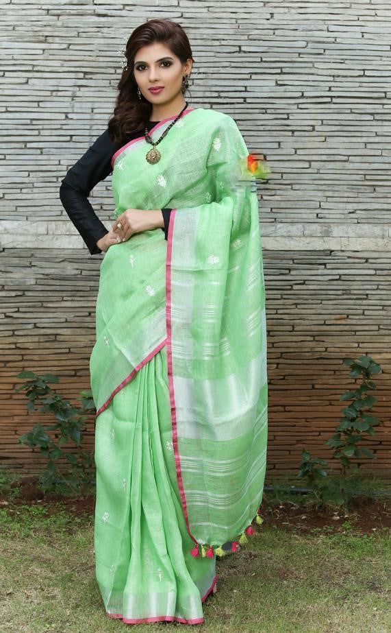Intricate Light Green Colored Festive Wear Linen Saree For Women