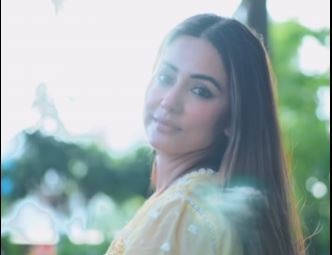 Hina Khan Shines in Ethereal Light Yellow Georgette Ensemble with Lakhnavi Embroidery