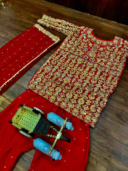 Red color party wear net Sharara plazo suit set