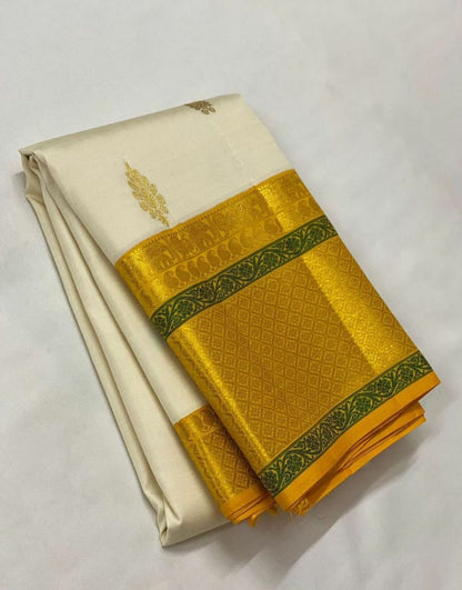 Party Wear Yellow Lichi Silk Jacquard saree with blouse