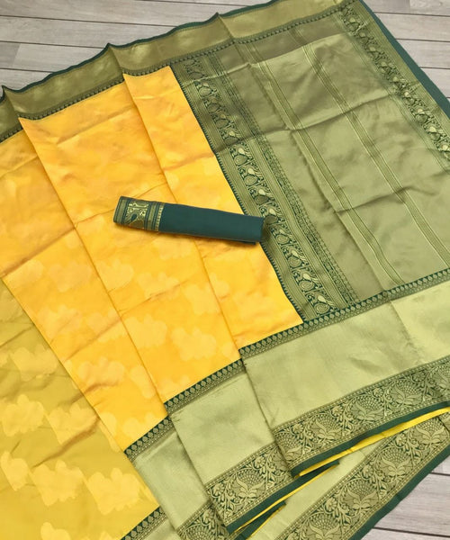 Yellow color Lichi Silk Jacquard saree with blouse