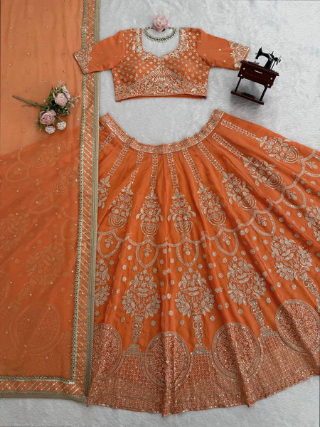 Exquisite Orange Faux Georgette Embroidered Lehenga Choli Set
