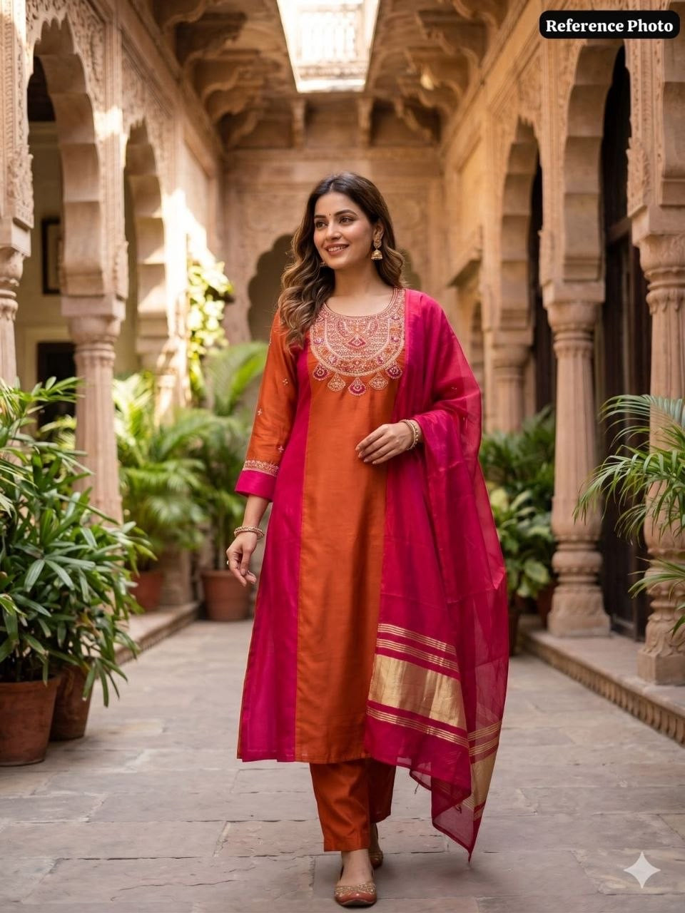 Rust kurta set in courtyard lifestyle view