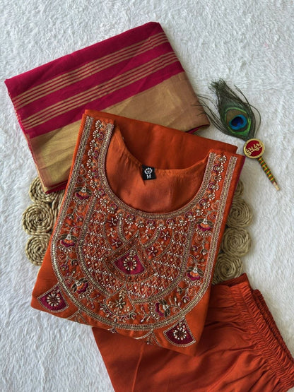 Rust kurta set embroidered neckline and fuchsia dupatta detail