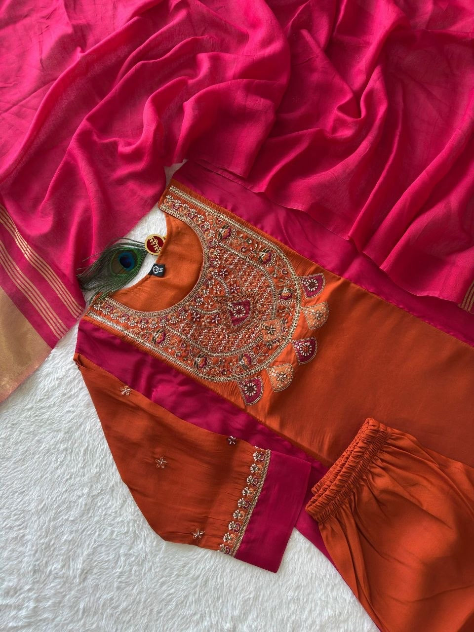 Rust kurta set with fuchsia dupatta product flat lay