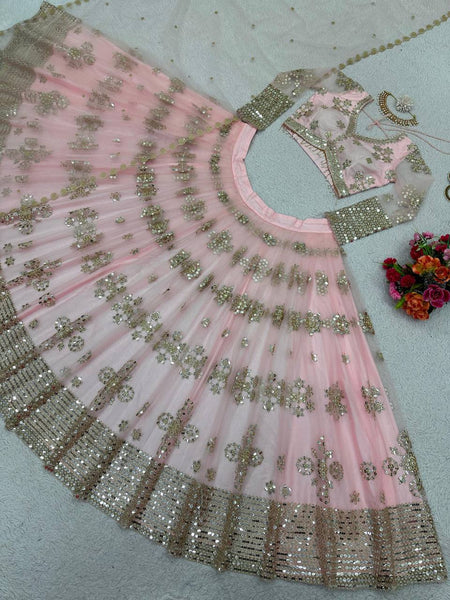 Latest Peach Color Butterfly Net Sequence Work Wedding Wear Lehenga Choli