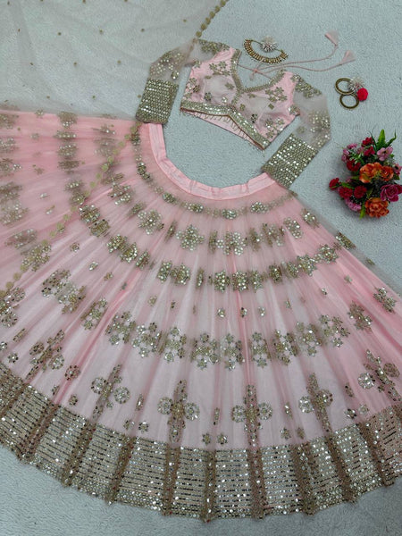 Latest Peach Color Butterfly Net Sequence Work Wedding Wear Lehenga Choli