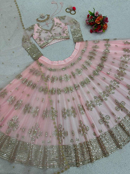 Latest Peach Color Butterfly Net Sequence Work Wedding Wear Lehenga Choli