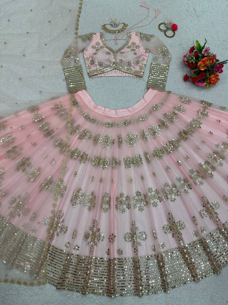 Latest Peach Color Butterfly Net Sequence Work Wedding Wear Lehenga Choli