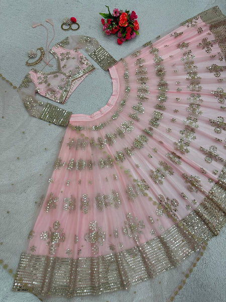 Latest Peach Color Butterfly Net Sequence Work Wedding Wear Lehenga Choli