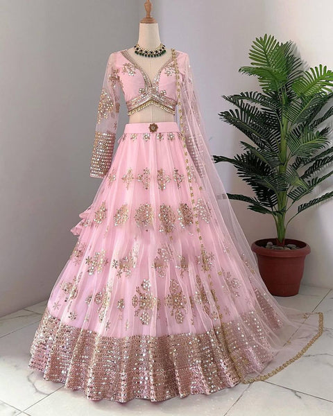 Latest Peach Color Butterfly Net Sequence Work Wedding Wear Lehenga Choli