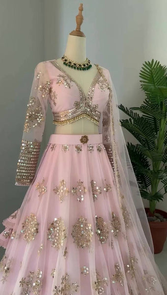 Latest Peach Color Butterfly Net Sequence Work Wedding Wear Lehenga Choli