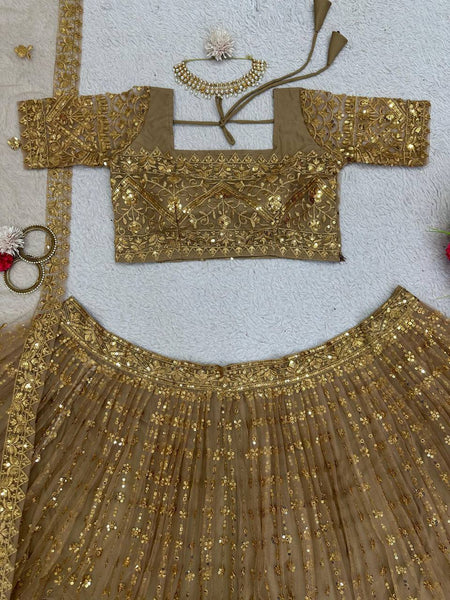 Wedding Wear Golden Color Sequence Work Butterfly Net Lehenga Choli