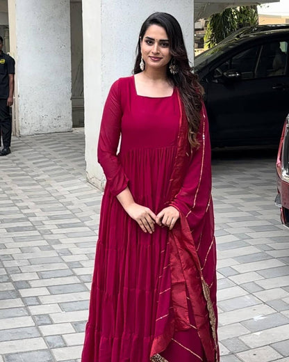 Pretty Magenta Color Georgette Ruffle Work Gown Dupatta