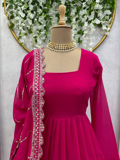 Pretty Magenta Color Georgette Ruffle Work Gown Dupatta