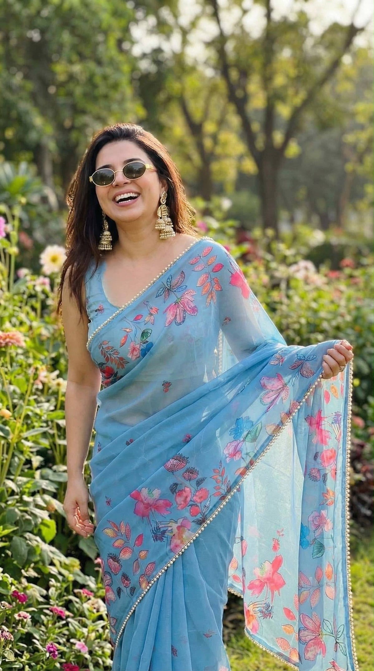 Sky Blue floral digital print soft georgette saree with pearl lace border