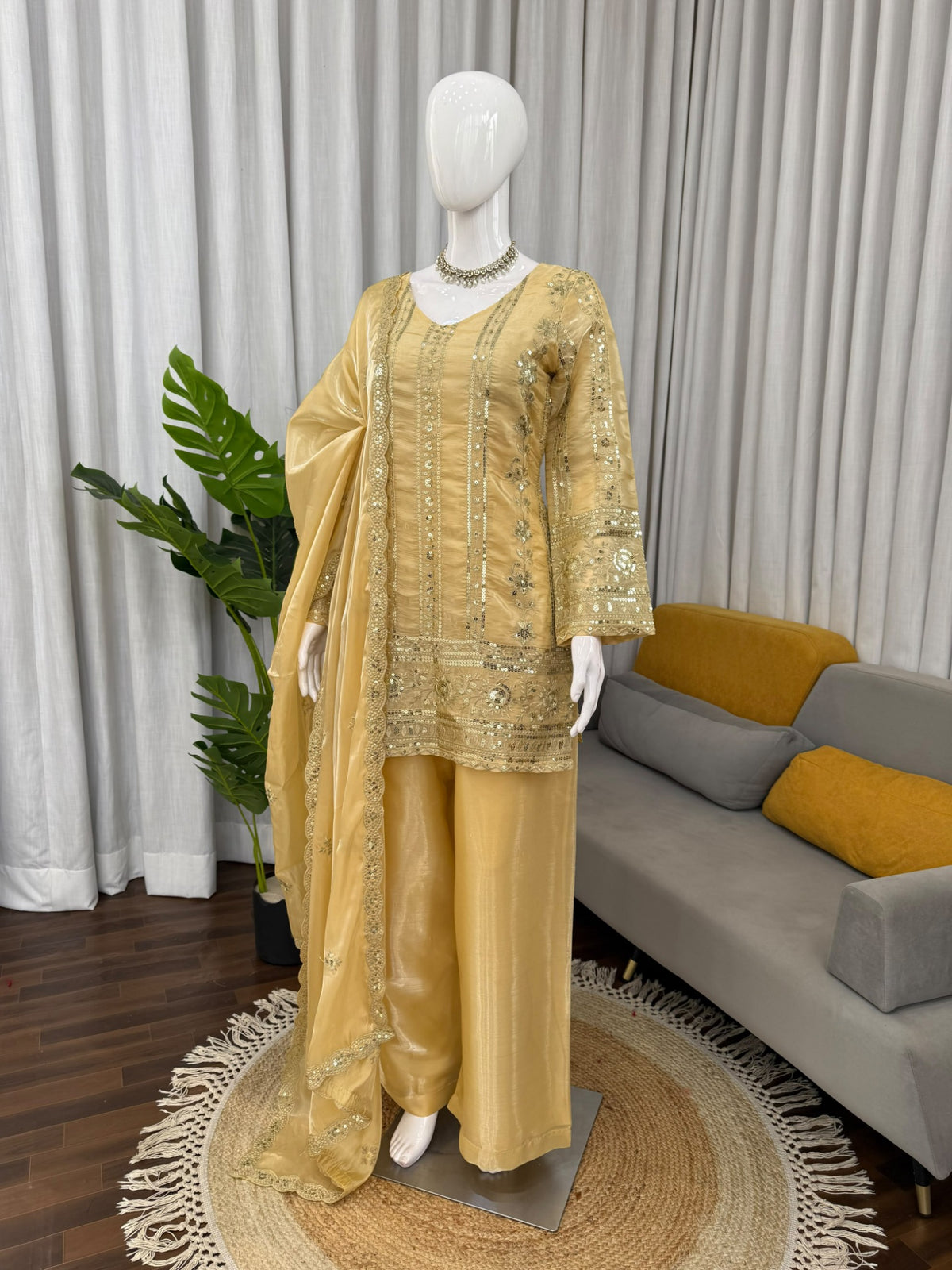 Golden yellow embroidered palazzo set angled mannequin view