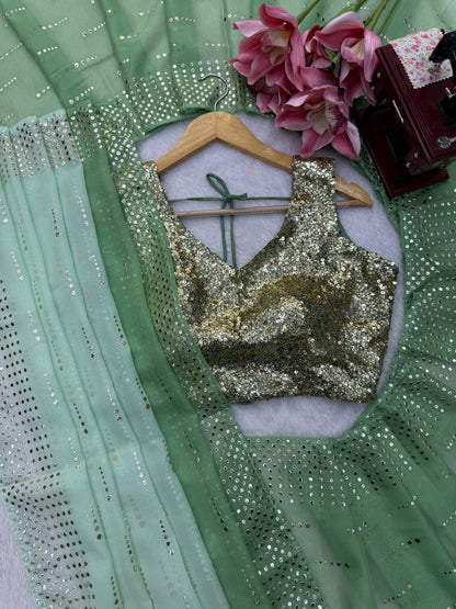 Foil work details on sage green designer saree