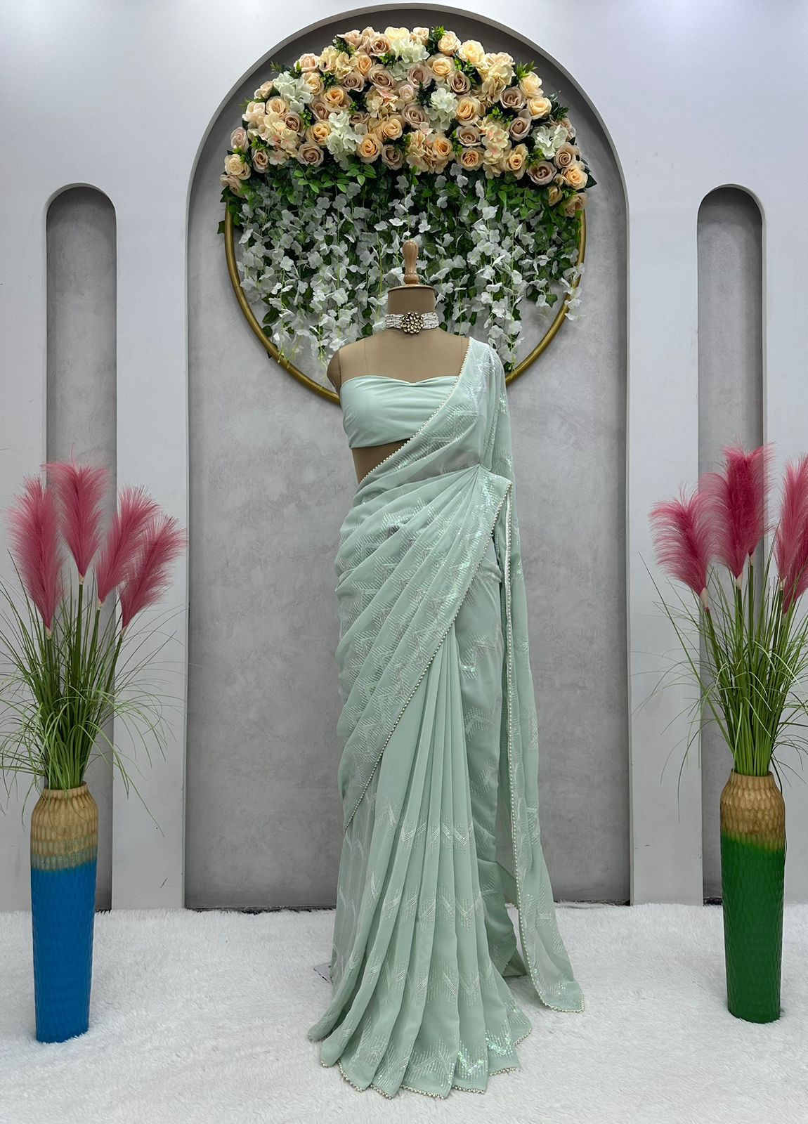 Latest awesome party wear light color georgette saree with blouse