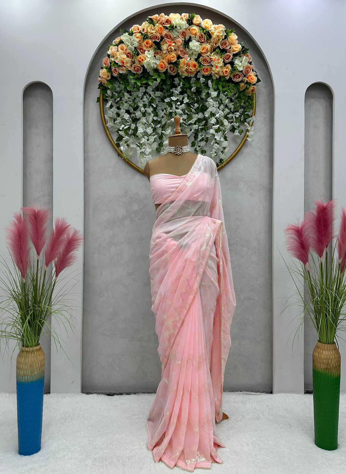 Latest awesome party wear light color georgette saree with blouse