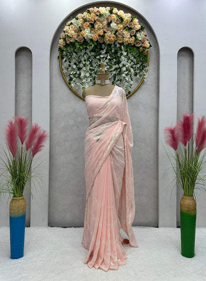 Latest awesome party wear light color georgette saree with blouse