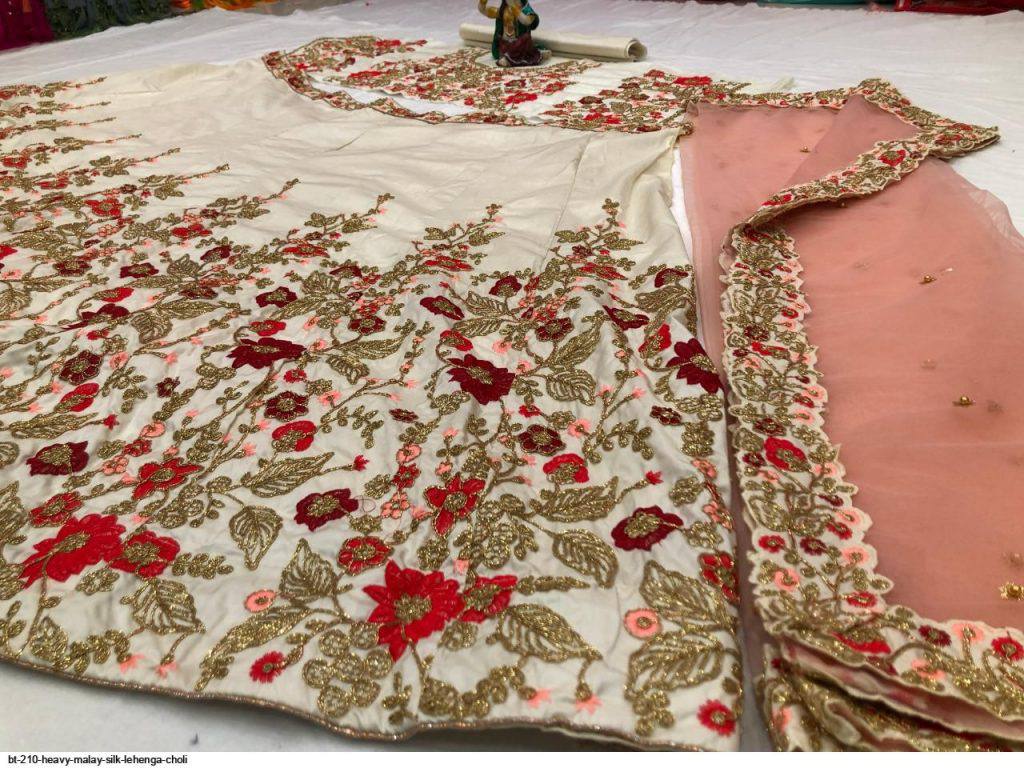 Captivation Off White Color Festive Wear Taffeta Silk Embroidered Work Lehenga Choli