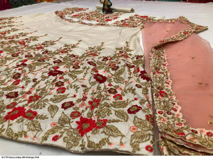 Captivation Off White Color Festive Wear Taffeta Silk Embroidered Work Lehenga Choli