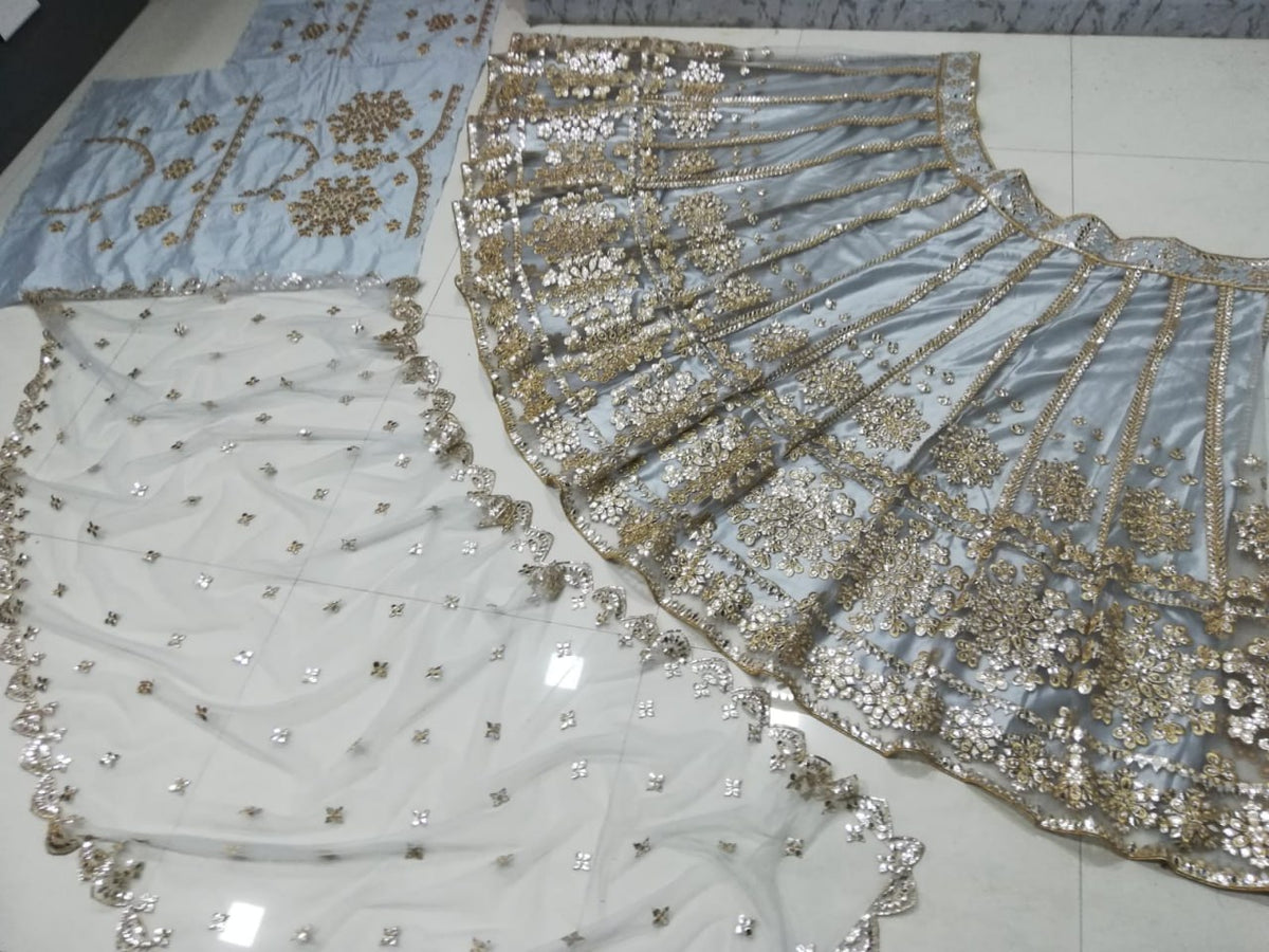 Elegant Gray Net Lehenga Choli with Mirror Jari Embroidery