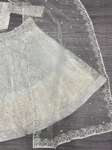 White Color Soft Net Semi Stitched Lehenga For Women