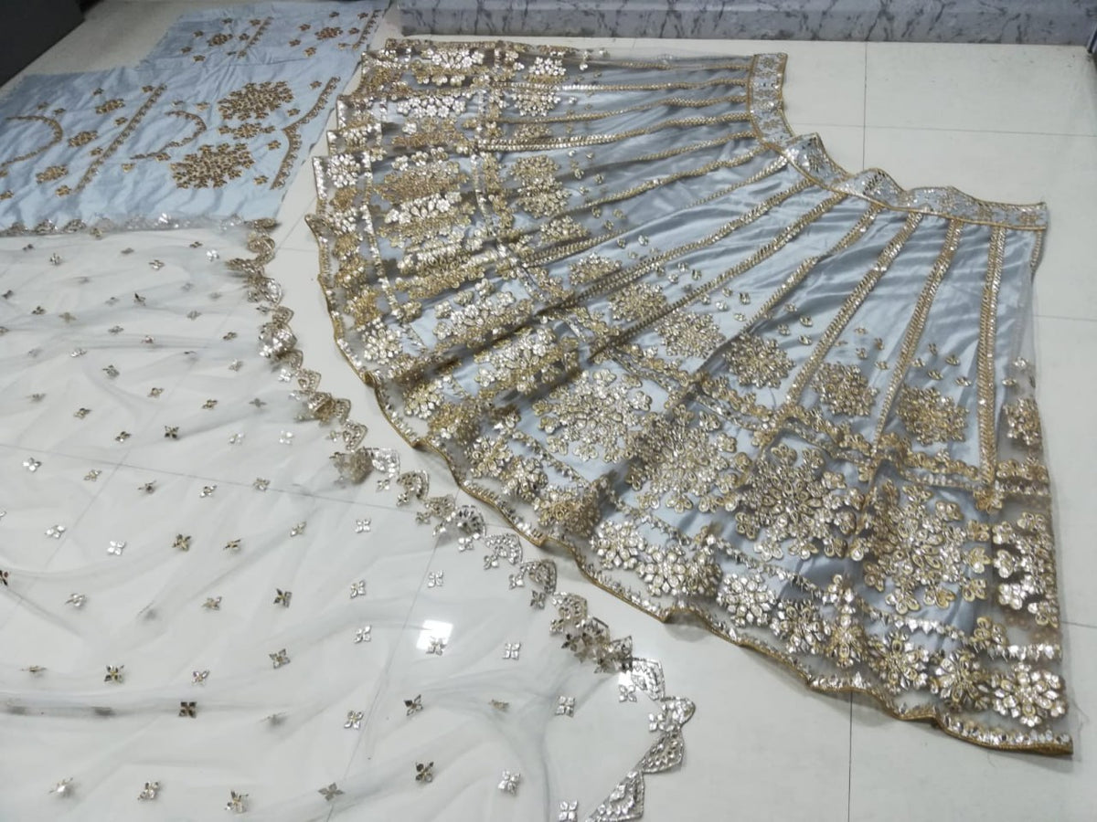 Elegant Gray Net Lehenga Choli with Mirror Jari Embroidery
