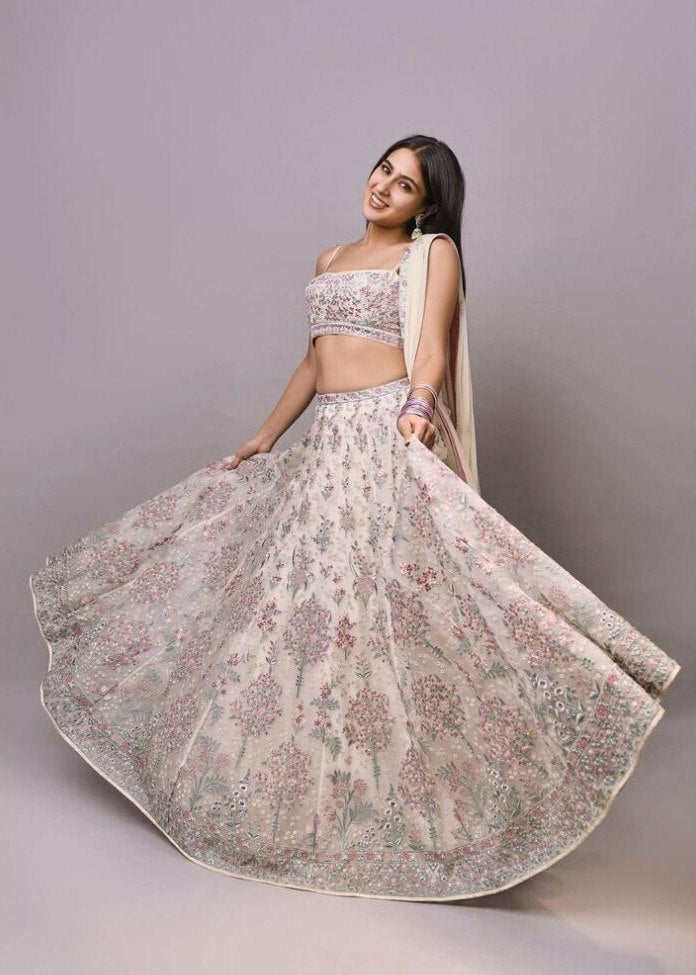 Exquisite Cream Georgette Lehenga Choli with Multi Thread Embroidery