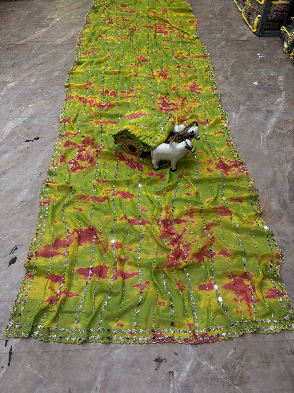 Full view of green digital print mirror work saree