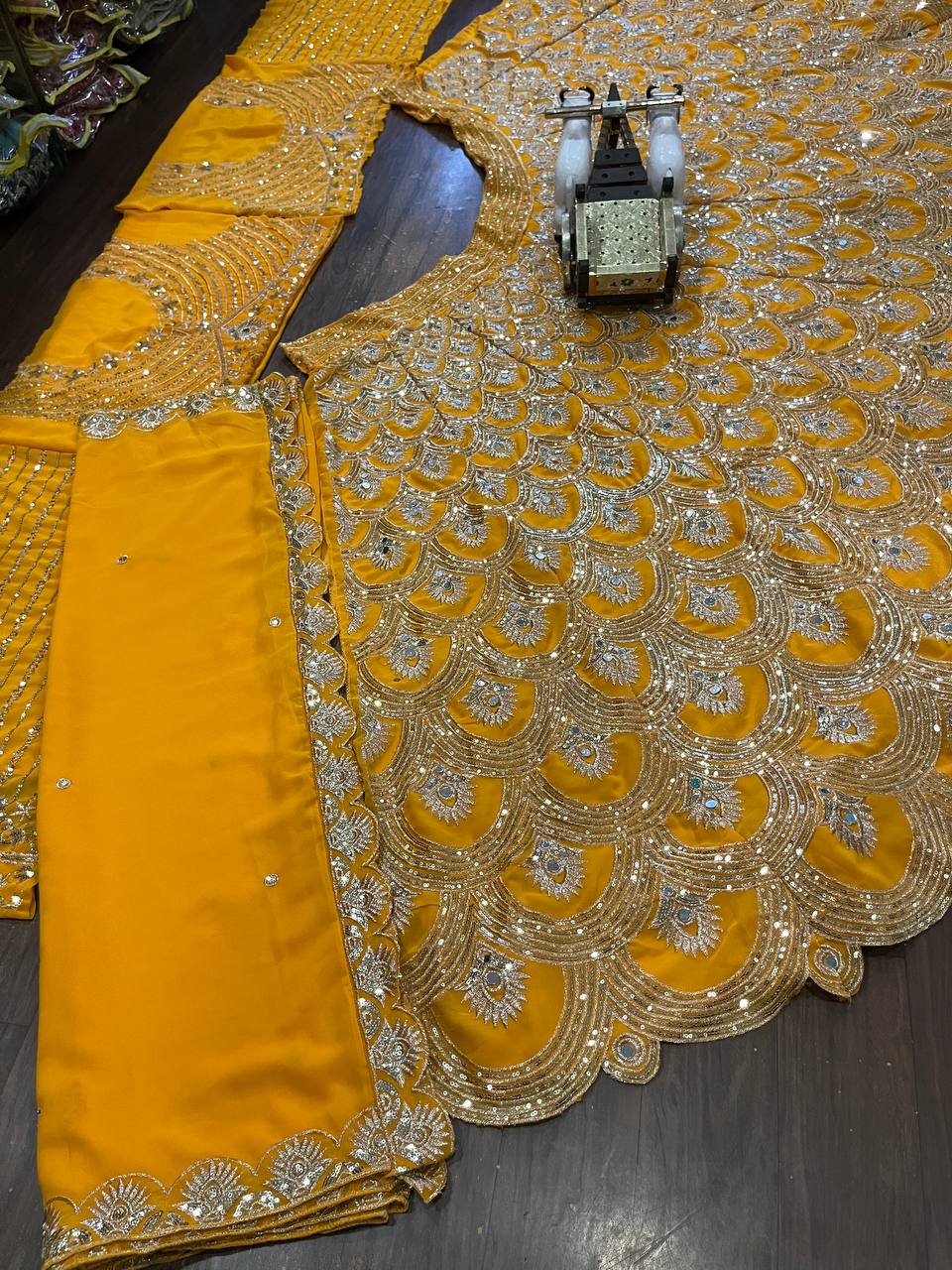Exquisite Faux Georgette Lehenga Choli with Real Mirror Sequins Work