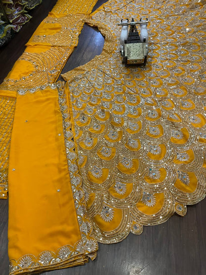 Exquisite Faux Georgette Lehenga Choli with Real Mirror Sequins Work