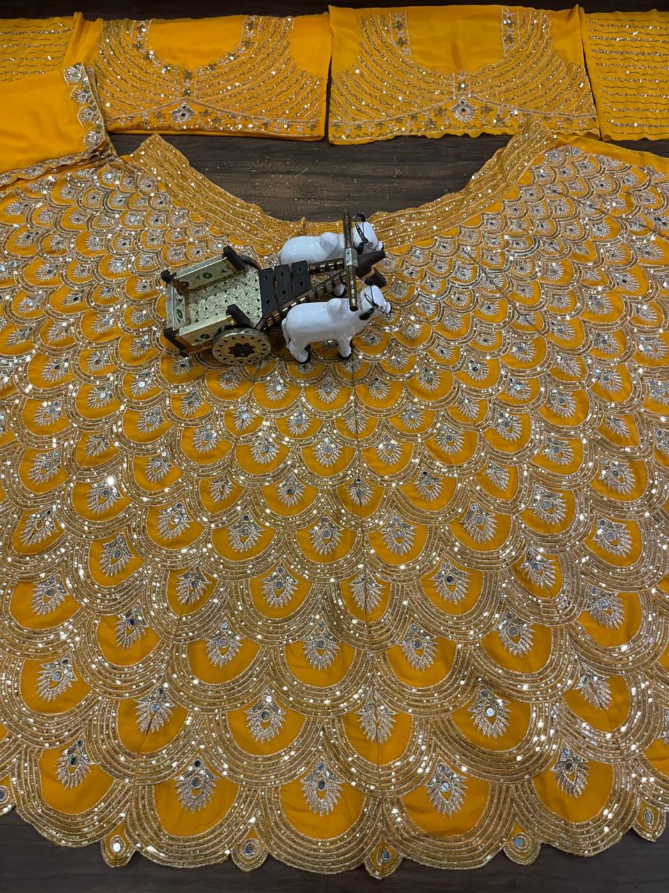 Exquisite Faux Georgette Lehenga Choli with Real Mirror Sequins Work