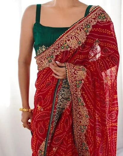 Red Soft Georgette Bandhani Saree with Heavy Embroidered Border & Banglori Satin Blouse Piece