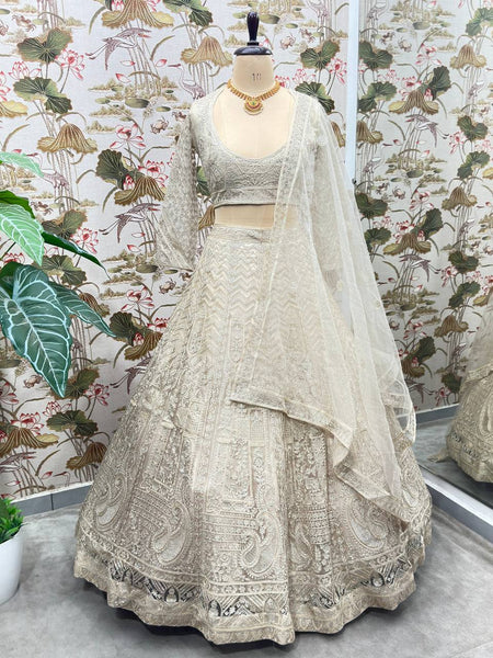 Off White Color Net Embroidery Lehenga Choli