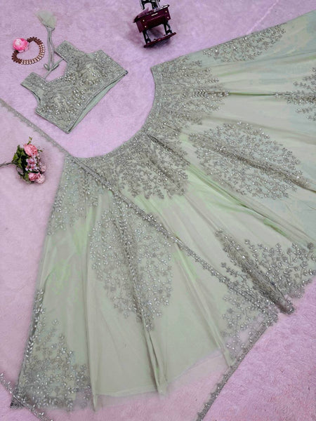 Exquisite Soft Butterfly Net Pista color Lehenga Choli with Sequence Coding Work