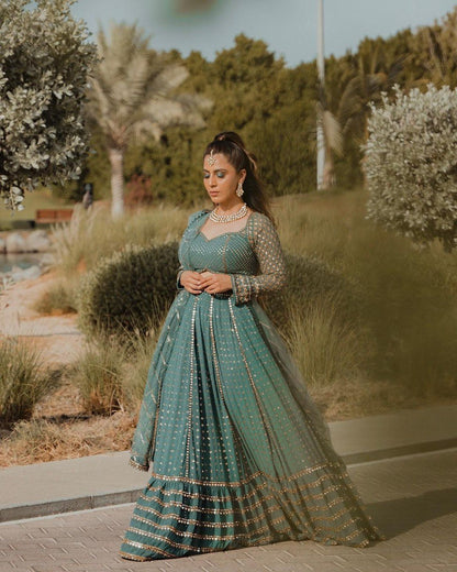 Bottle Green Embroidered Faux Georgette Lehenga Choli Set